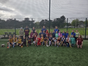 Players and coaches from Na Fianna and St. Oliver Plunkett Eoghan Ruadh after the blitz
